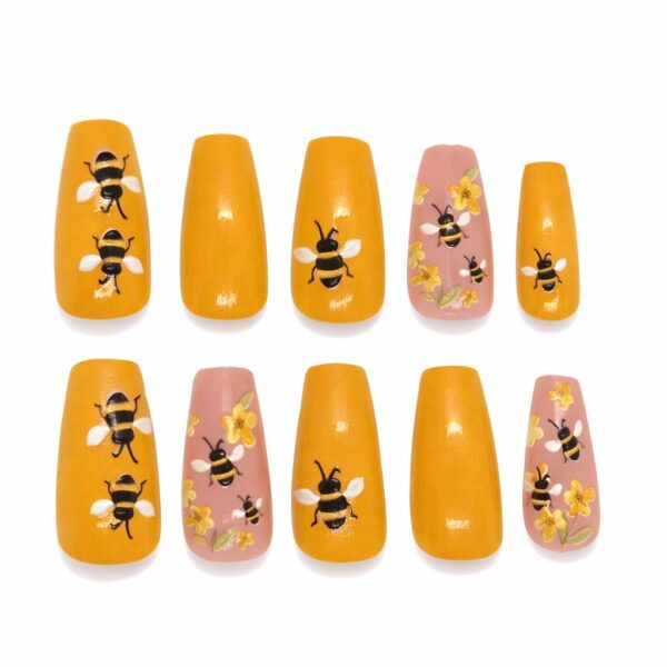 bee-and-flower-press-on-nails-yellow-summer-nail-art-glamour-woman