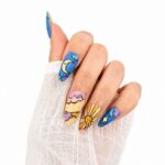 sun-and-moon-long-almond-press-on-nails-on-hand